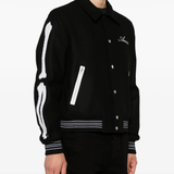 black  jacket warn a person,showing the jacket fit