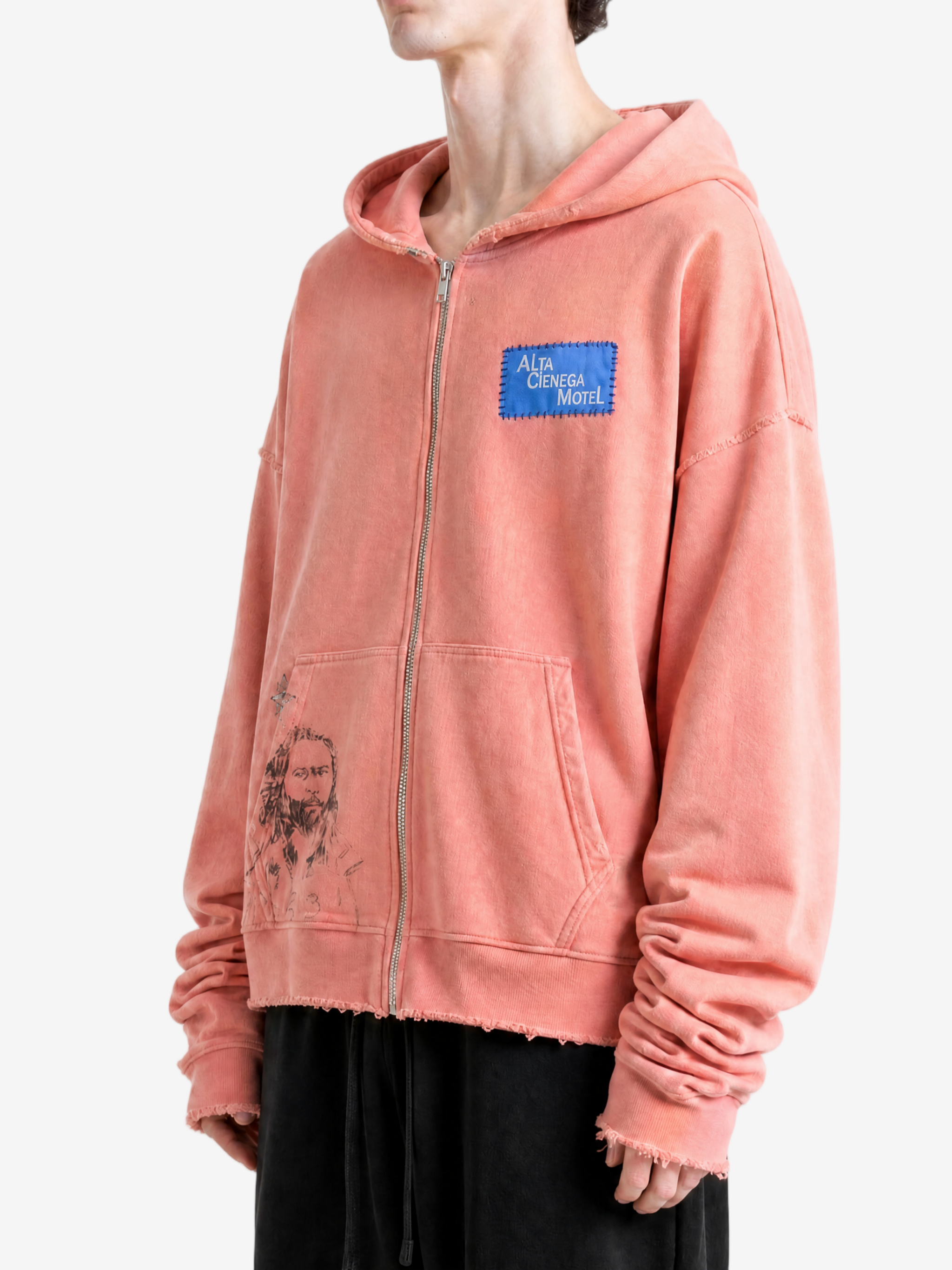 Black hoodie worn by a person, showing the hoodie fit