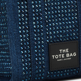 Close up of the blue bag, showing texture of the cotton fabric