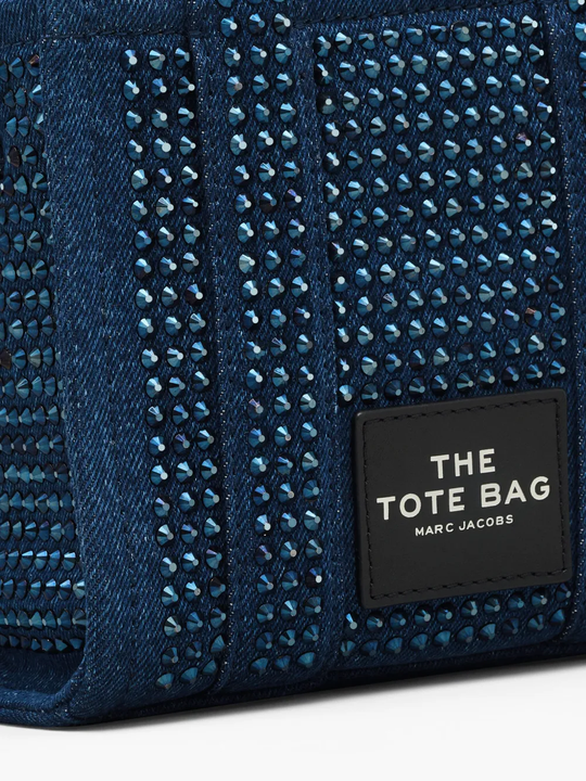 Close up of the blue bag, showing texture of the cotton fabric