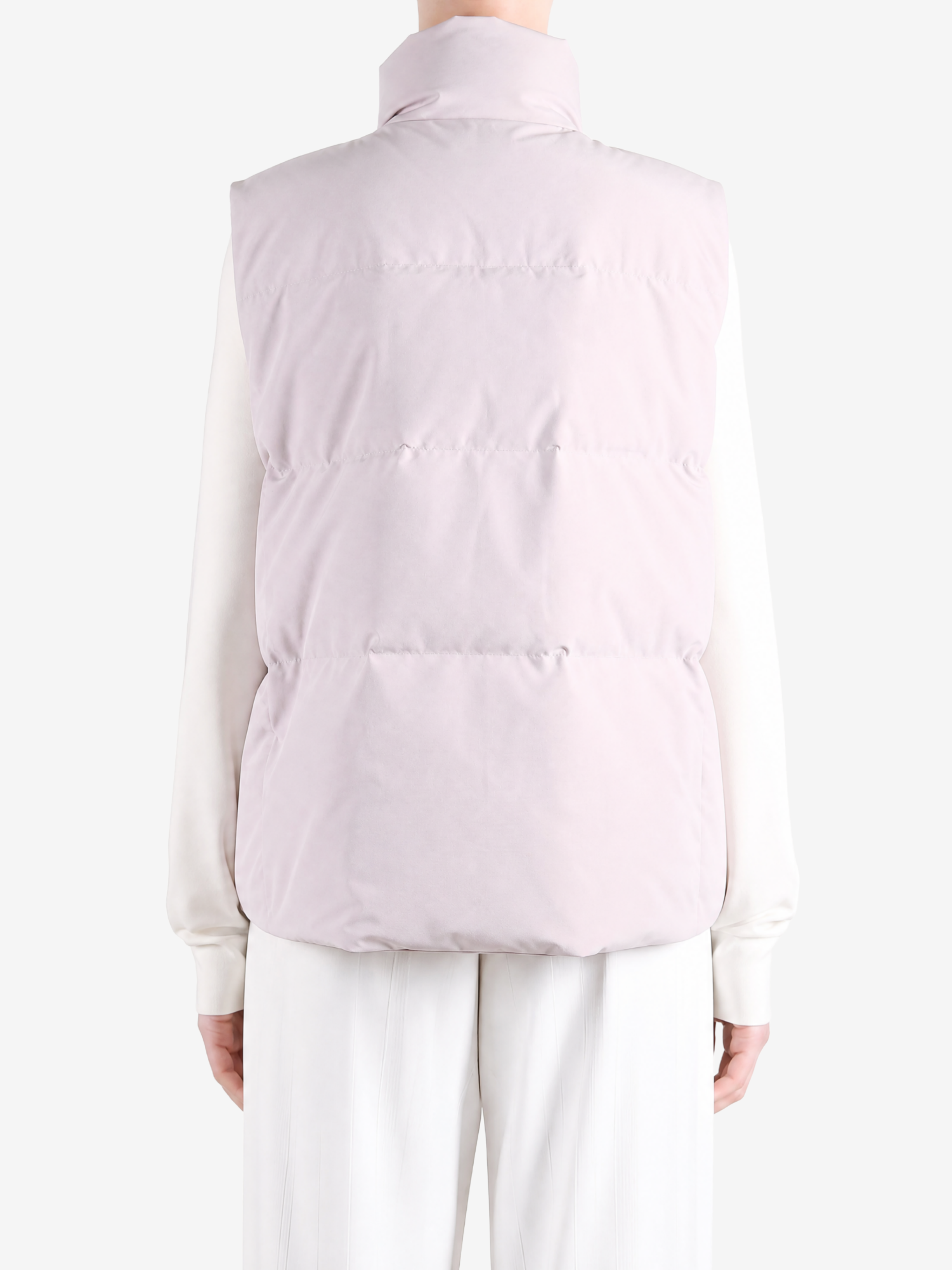 Pink top worn by a person, showing the top fit
