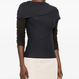 navy t-shirt worn by a person, showing the t-shirt fit