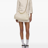 Tan bags, full body view