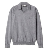 Grey knitwear, front view