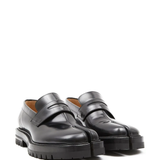 Black loafer, side view