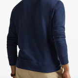 Blue sweatshirt worn by a person, showing the sweatshirt's  fit