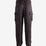 Brown pant worn by a person, showing the pant's fit