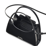 Close up of the black bag, showing texture of the leather fabric