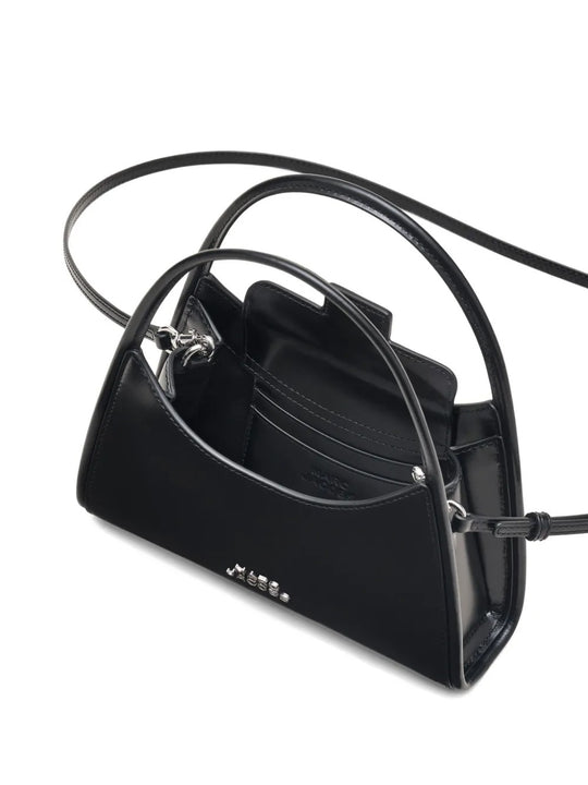 Close up of the black bag, showing texture of the leather fabric