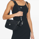 Black bag worn by a person, showing the bag fit