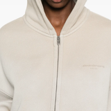 Close up of tan hoodie,showing texture of the cotton fabric
