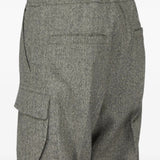 Grey pants worn by a person, showing the pants fit