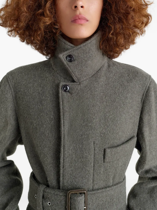 Close up of grey coat,showing texture of the cotton fabric.