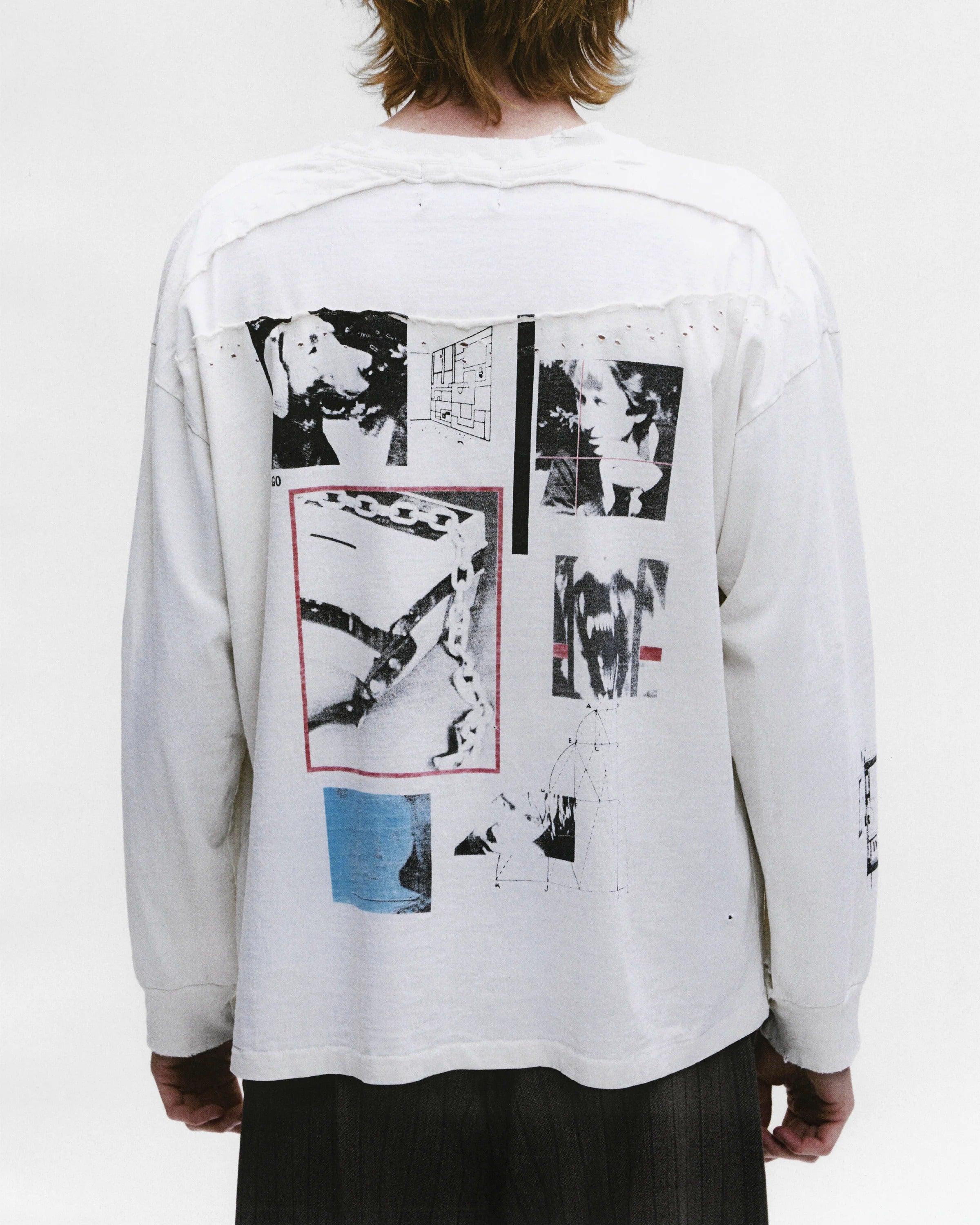 White t-shirt worn by a person, showing the shirt's fit