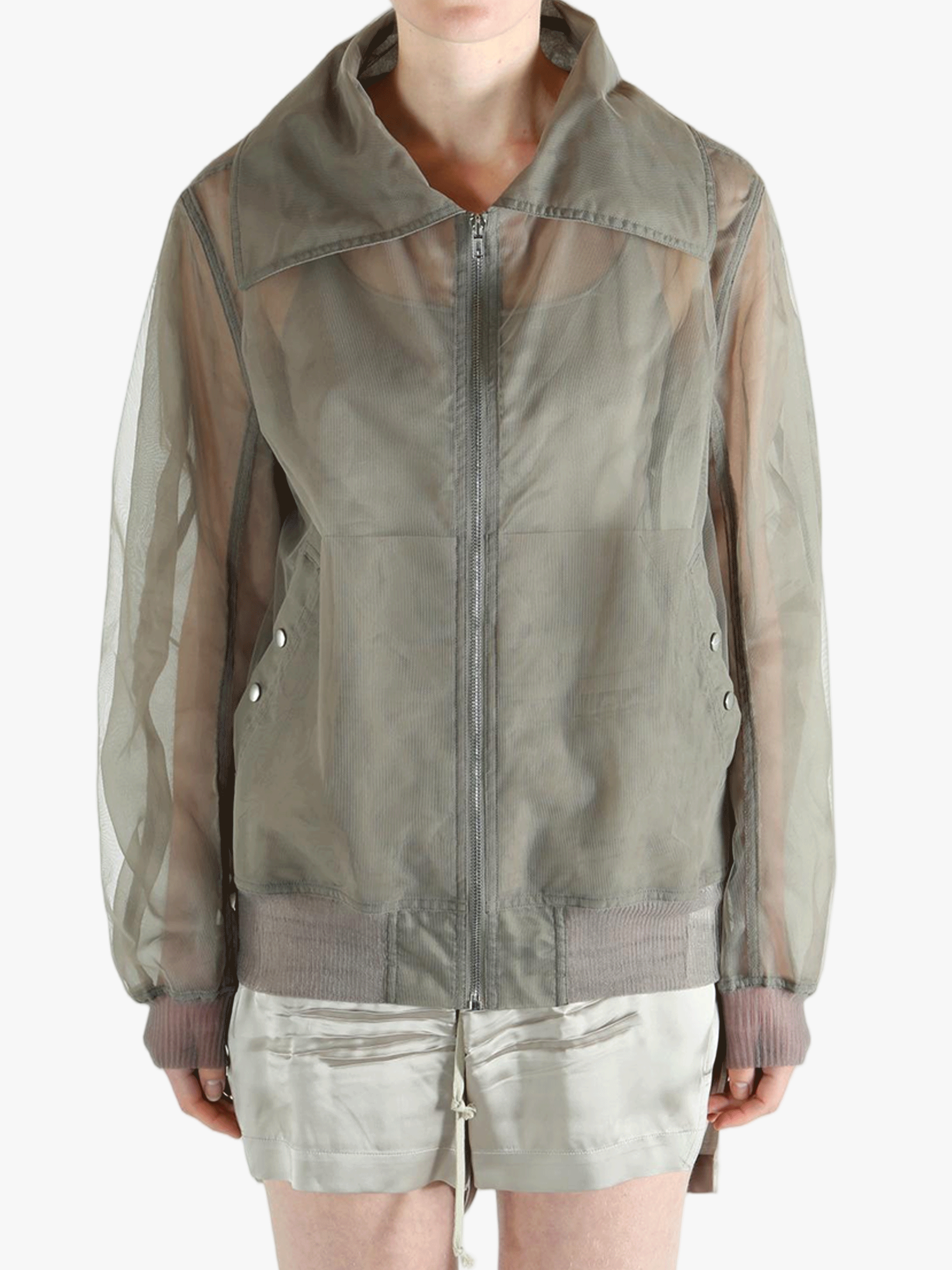 Grey jacket worn by a person, showing the jacket's fit