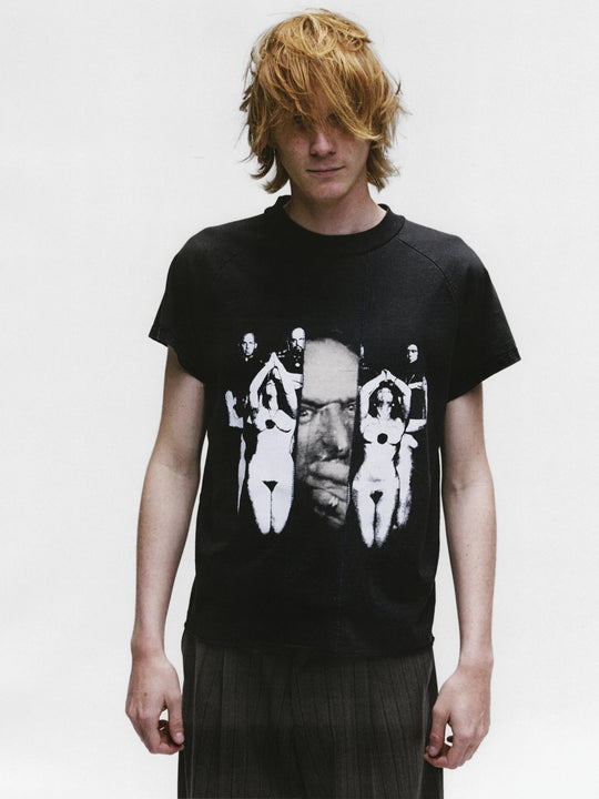 Black shirts worn by a person, showing the shirts fit