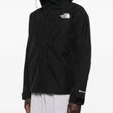 Black jackets worn by a person, showing the jackets fit