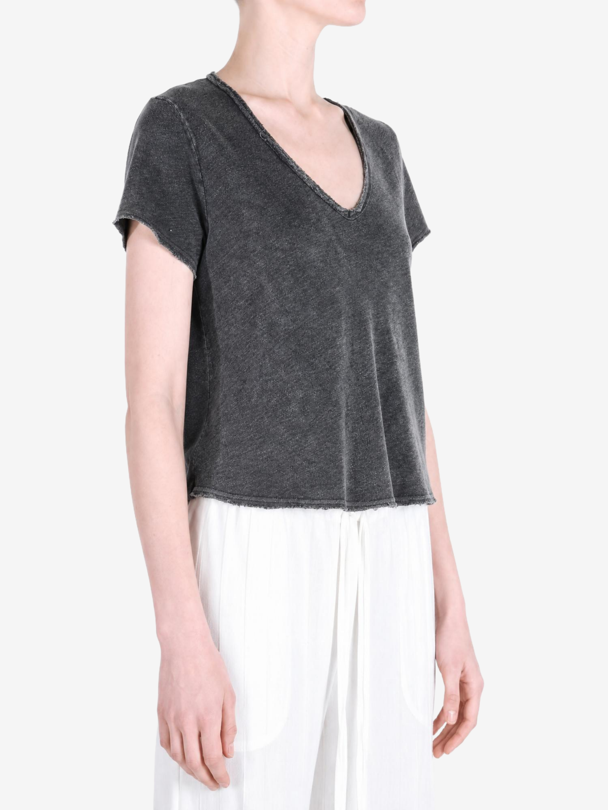 Black t-shirt worn by a person, showing the t-shirt fit