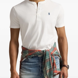 White t-shirt worn by a person, showing the t-shirt fit