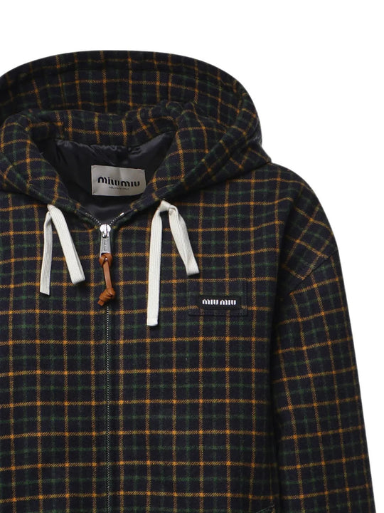 Close up of Navy jacket, showing texture of the 100% cotton fabric