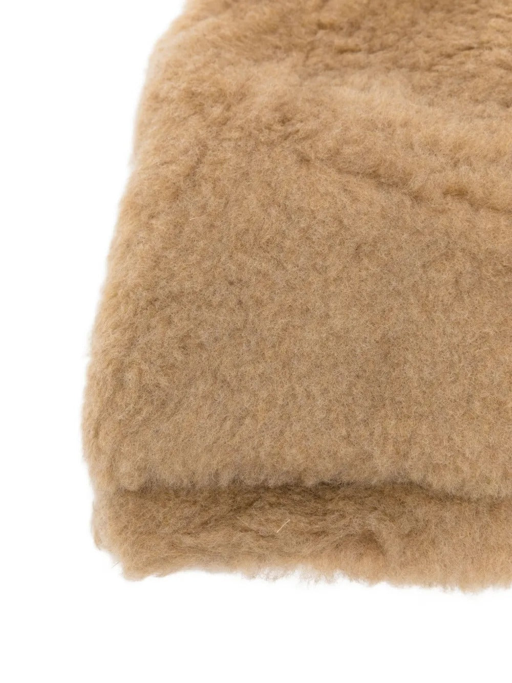 Close up of the tan hat, showing texture of the artificial fur fabric
