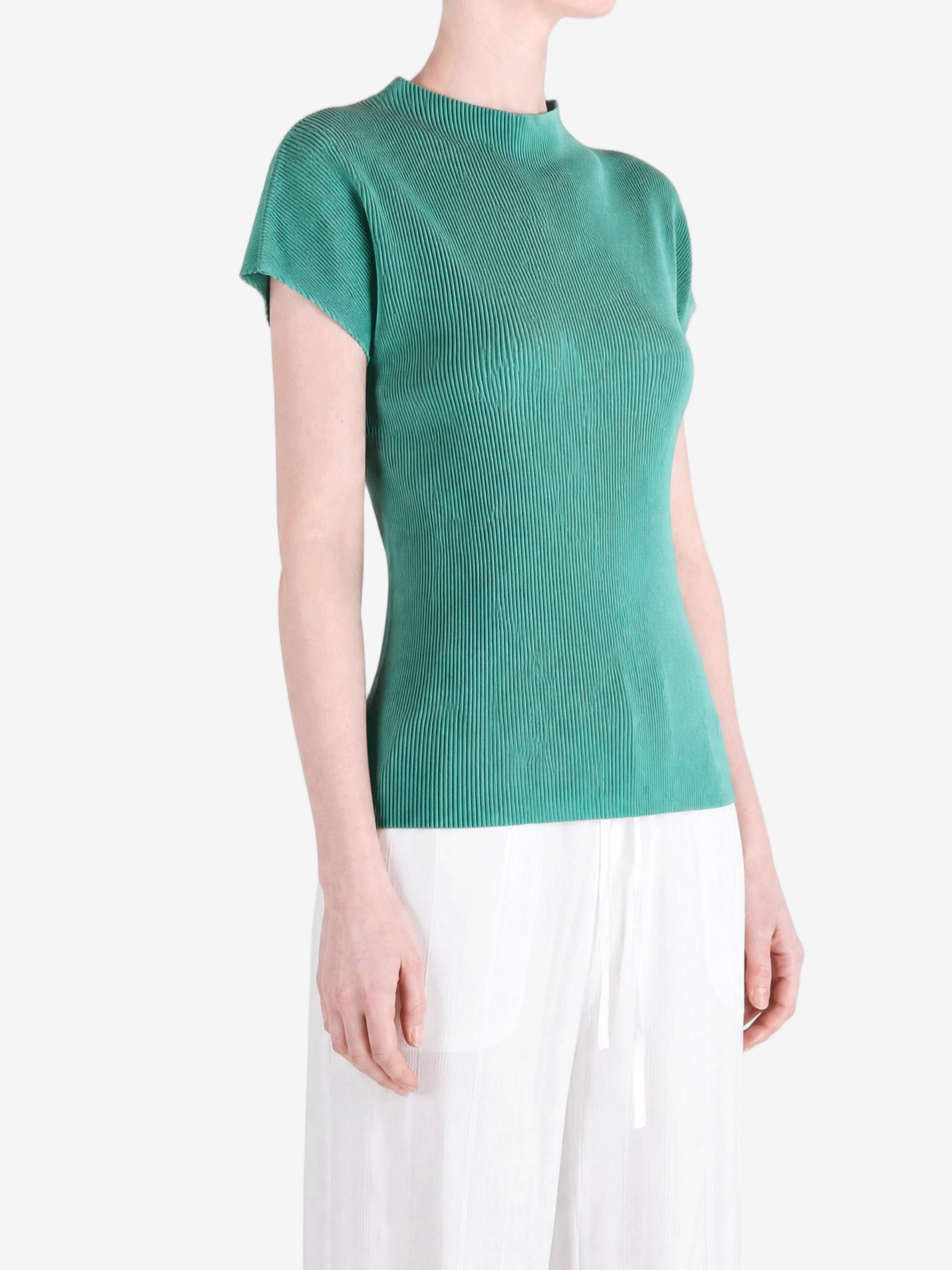Green shirt worn by a person, showing the shirt fit