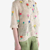 Tan shirts worn b a perosn, showing the shirt's fit