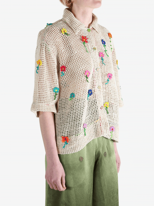 Tan shirts worn b a perosn, showing the shirt's fit