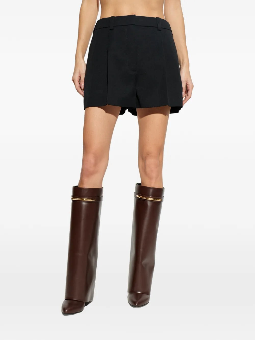 Black shorts worn by a person, showing the shorts fit