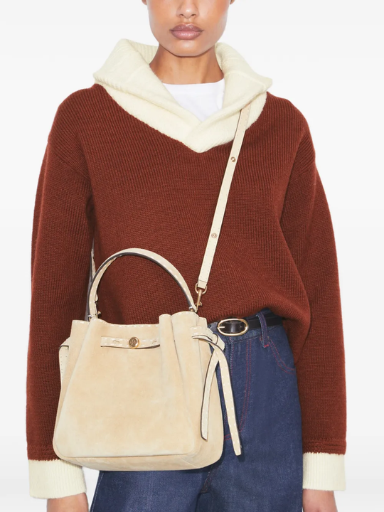 Tan bags worn by a person, showing the bags's fit