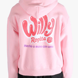 Pink hoodie worn by a person, showing the hoodie's fit