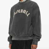 Grey hoodie worn by a person, showing the hoodie fit