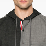 Close up of the grey sweater, showing texture of the cotton fabric