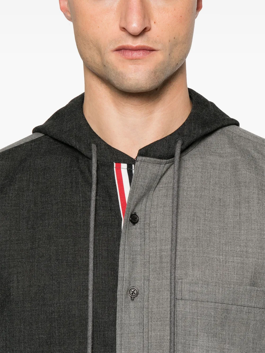 Close up of the grey sweater, showing texture of the cotton fabric