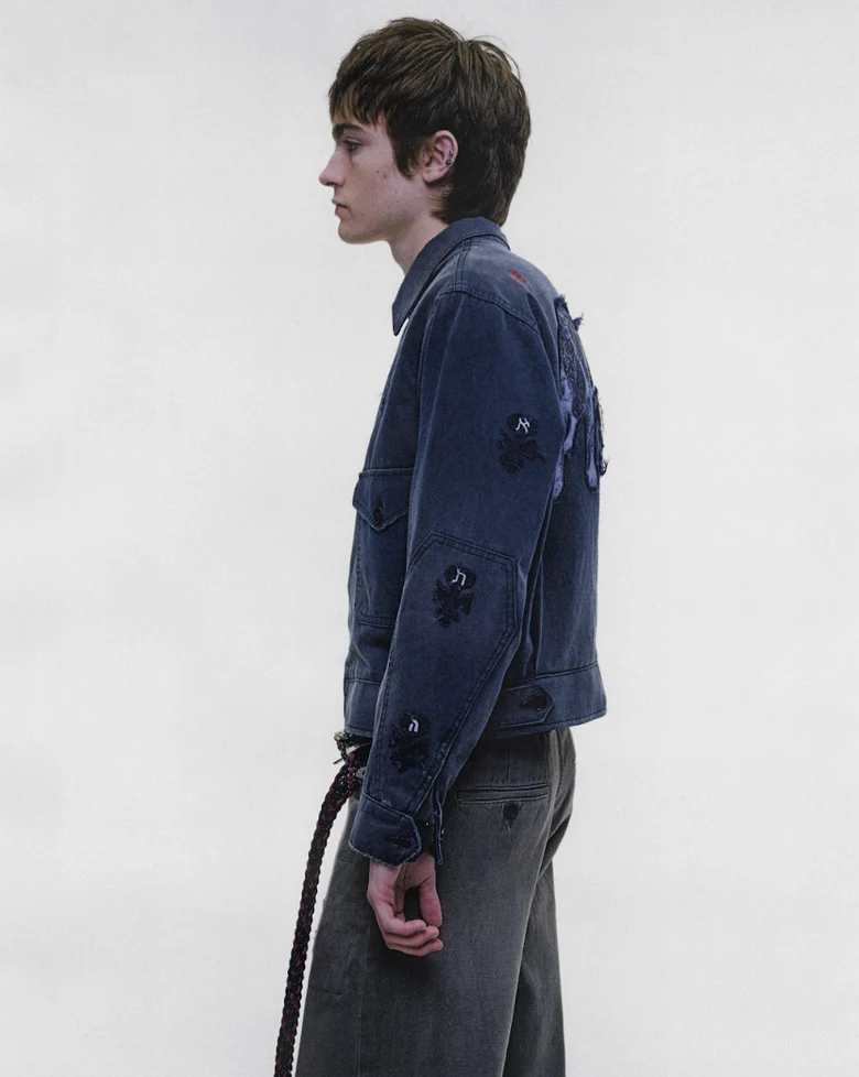 Navy jacket worn by a person, showing the jacket fit