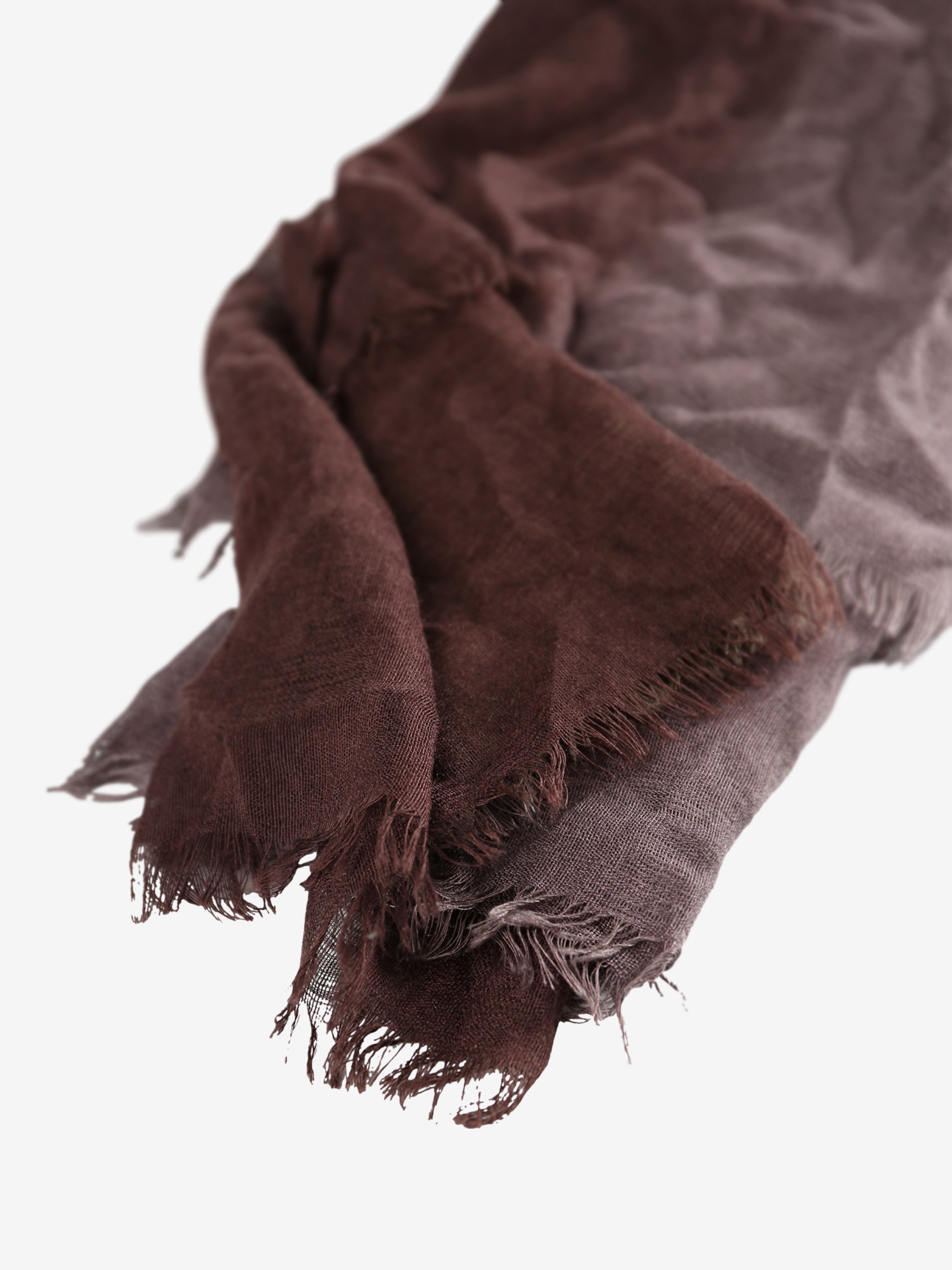 Close up of brown scarves, showing texture of the cashmere fabric