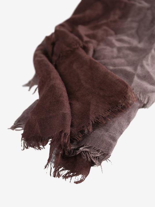 Close up of brown scarves, showing texture of the cashmere fabric