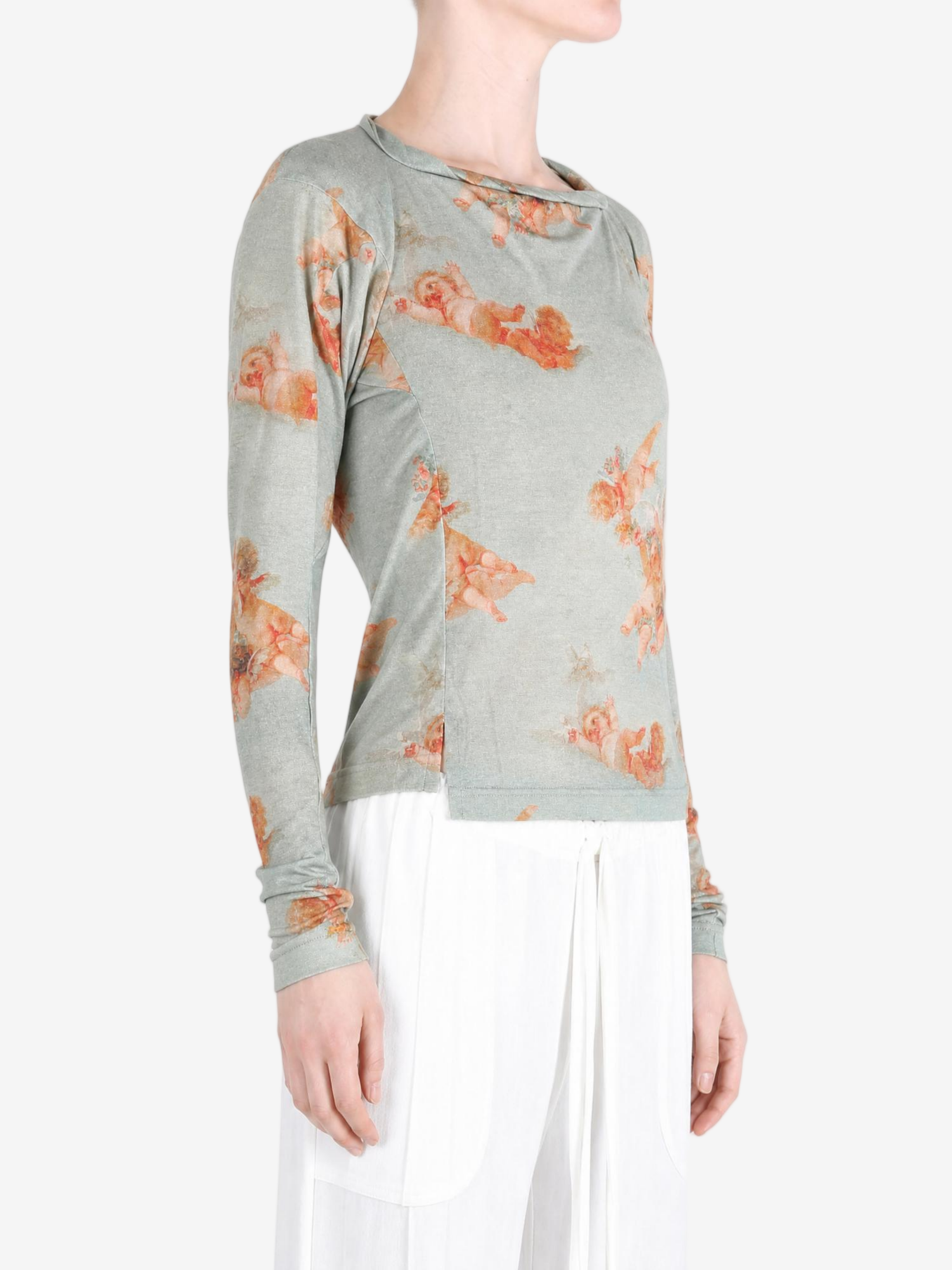 Grey top worn by a person, showing the top fit