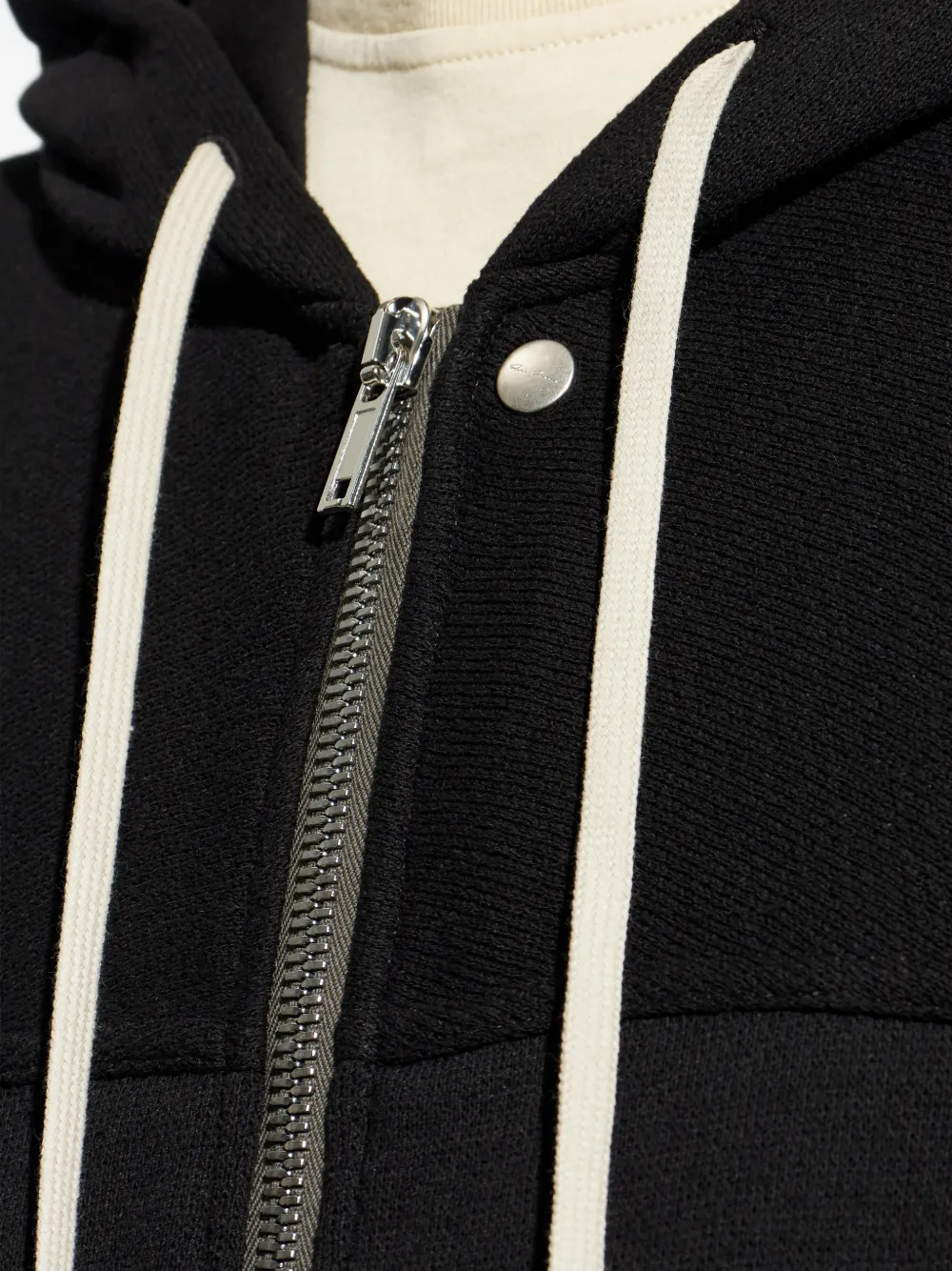Close up of black Jacket, showing texture of the Cotton fabric