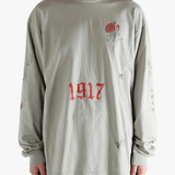 Grey tops worn by a person, showing the top fit