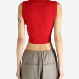 Red top worn by a person, showing the top's fit