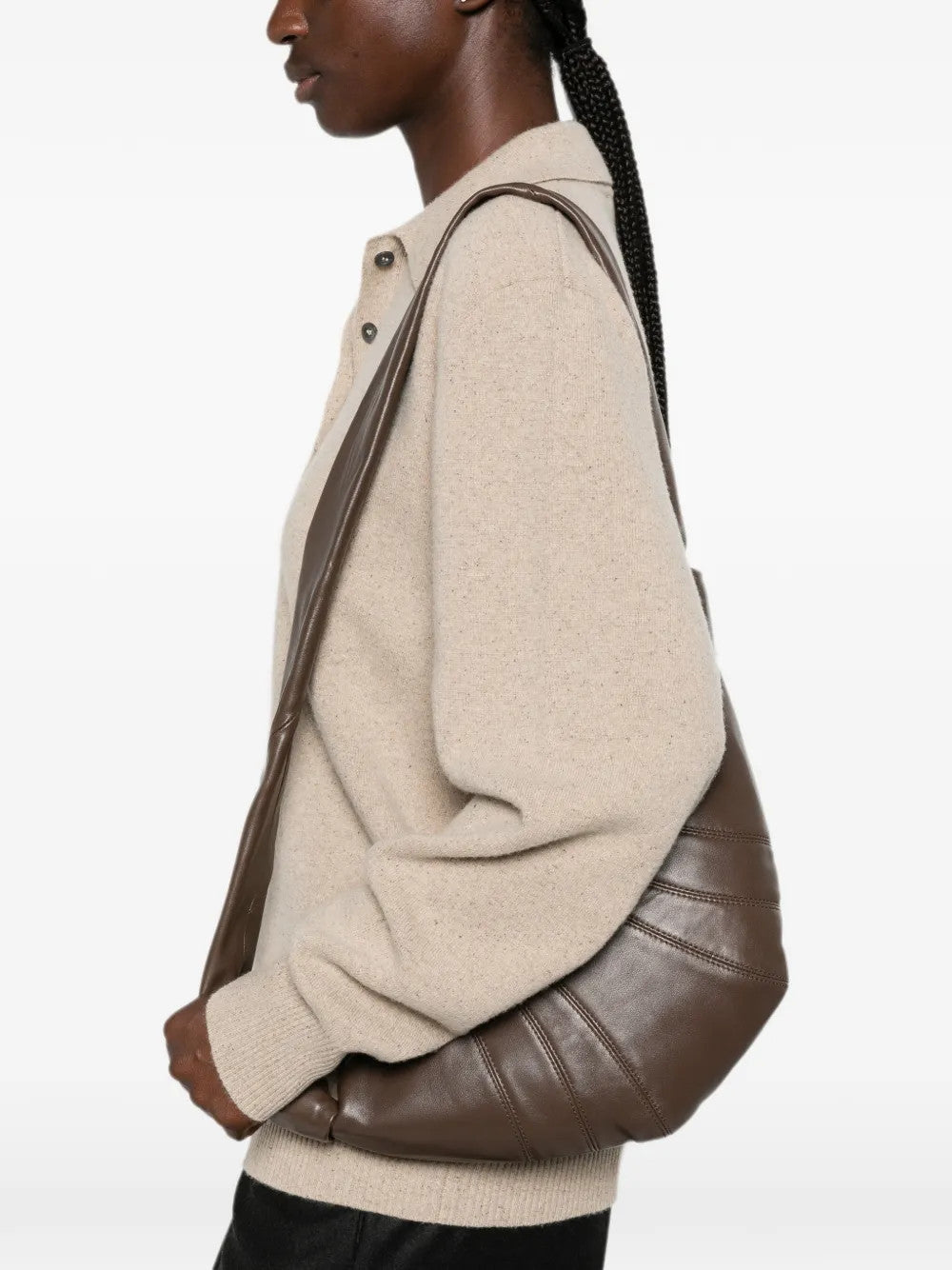 Brown bag worn by a person, showing the bag fit