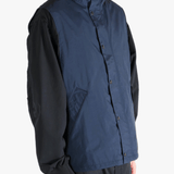 Blue tops worn by a person, showing the tops fit