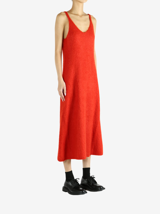 Red dress worn by a person, showing the dress's fit