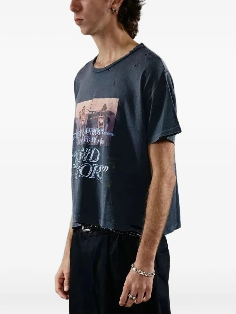 Black t-shirt worn by a person, showing the shirt's fit