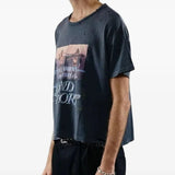 Black t-shirt worn by a person, showing the shirt's fit