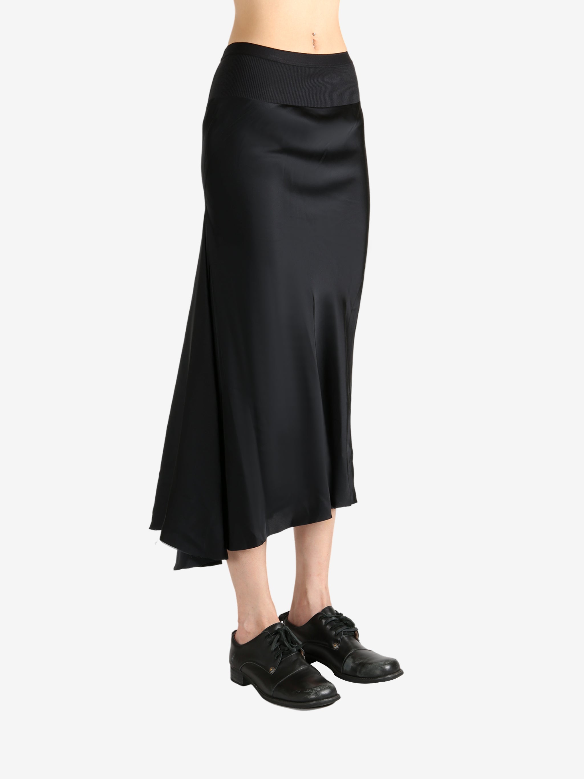Black skirt worn by a person, showing the skirt's fit