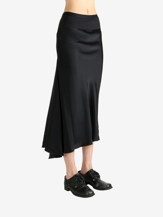 Black skirt worn by a person, showing the skirt's fit