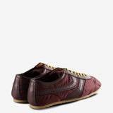 Brown sneakers, back view