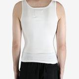 White tank worn by a person, showing the tank fit